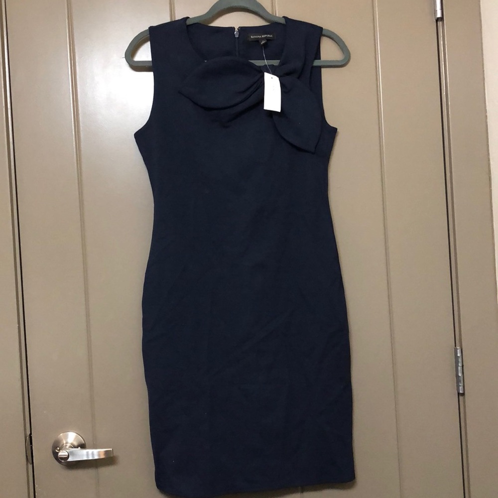 Dark blue dress with bow